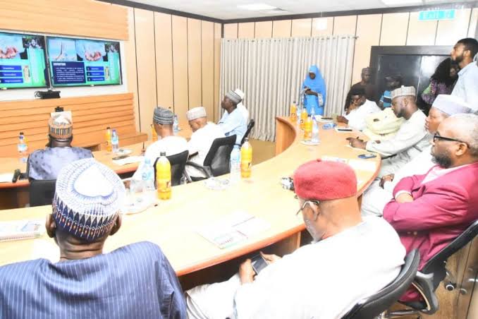 Scholars in a technical session