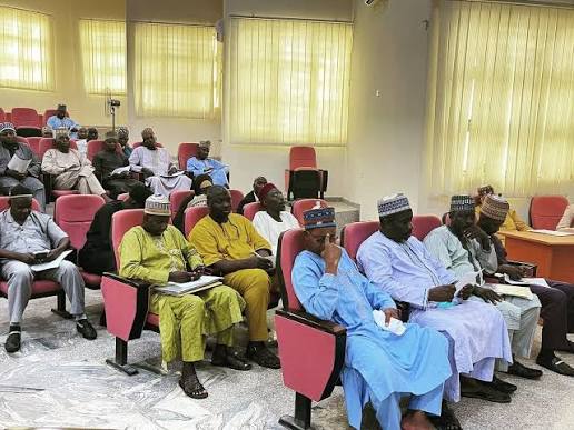 Conference audience in traditional attire